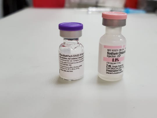  Close-up of the Pfizer-BioNTech vaccine. Public health nurses will continue to vaccinate hundreds of EMS personnel in the days ahead by appointment only. The general public is expected to begin receiving their vaccinations in the springtime.
