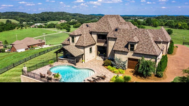 The swimming pool, patio and outdoor entertaining space at the Centerpoint Road home.