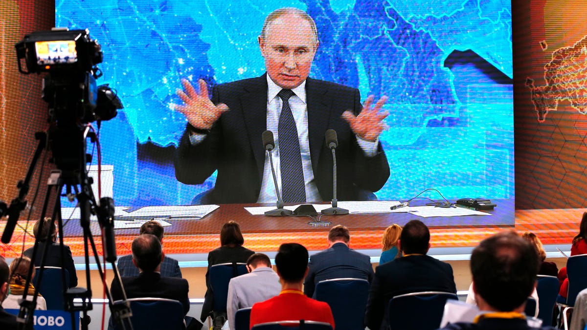 Russian President Vladimir Putin speaks via video call during his annual year-end news conference in Moscow on Dec. 17, 2020.