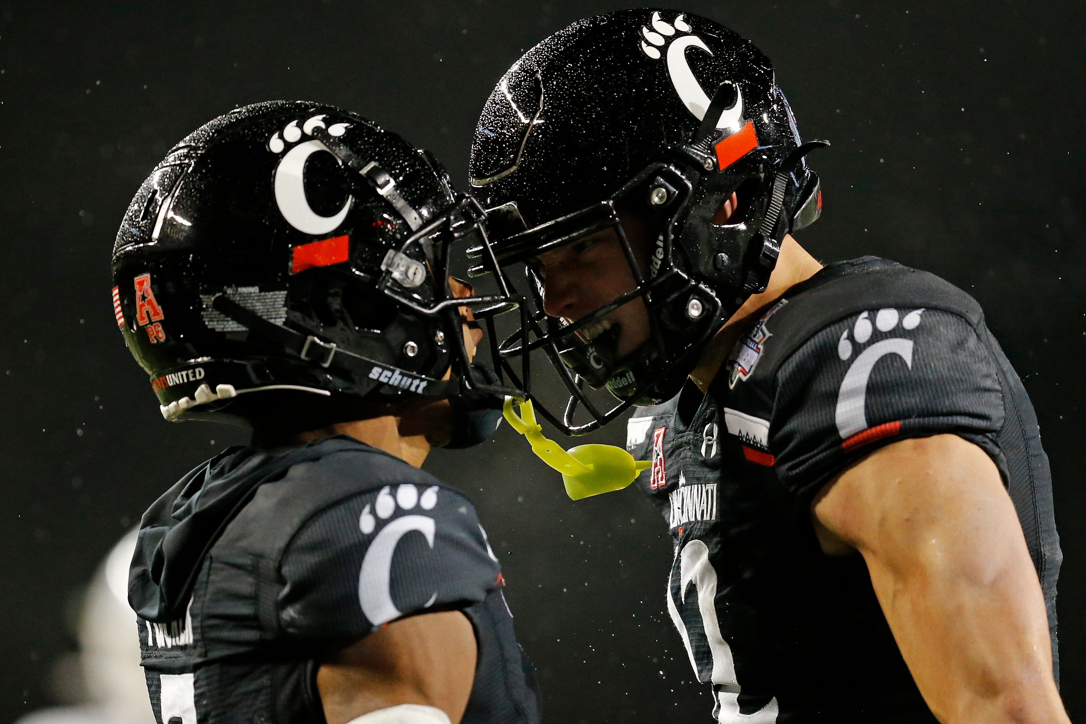 Reactions: UC Bearcats defeat Tulsa, 27-24, for AAC Championship