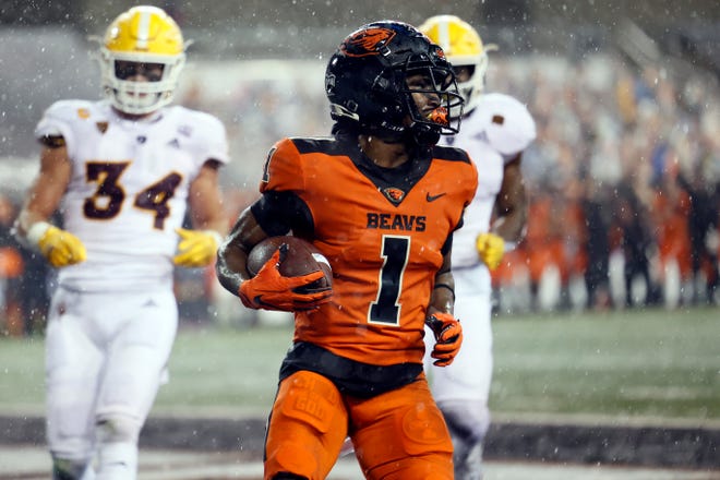 Dec 19, 2020; Corvallis, Oregon, USA; Oregon State Beavers wide receiver Tyjon Lindsey (1). runs into the end zone for a touchdown against the Arizona State Sun Devils during the first half at Reser Stadium. Mandatory Credit: Soobum Im-USA TODAY Sports