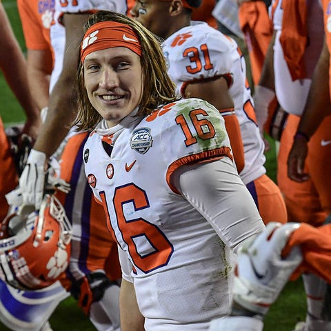 Clemson quarterback Trevor Lawrence (16) celebrate