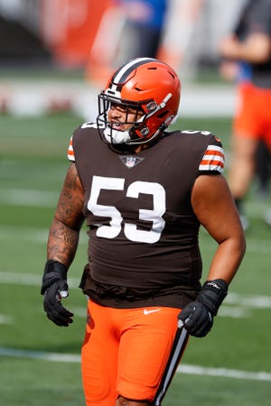 Cleveland Browns center Nick Harris (53) warms up before an NFL football game against the Indianapolis Colts, Sunday, Oct. 11, 2020, in Cleveland. (AP Photo/Ron Schwane)