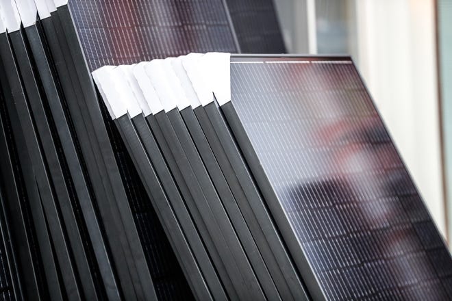 Solar panels at a rural property in Lebanon, Ind., Monday, Dec, 2020.