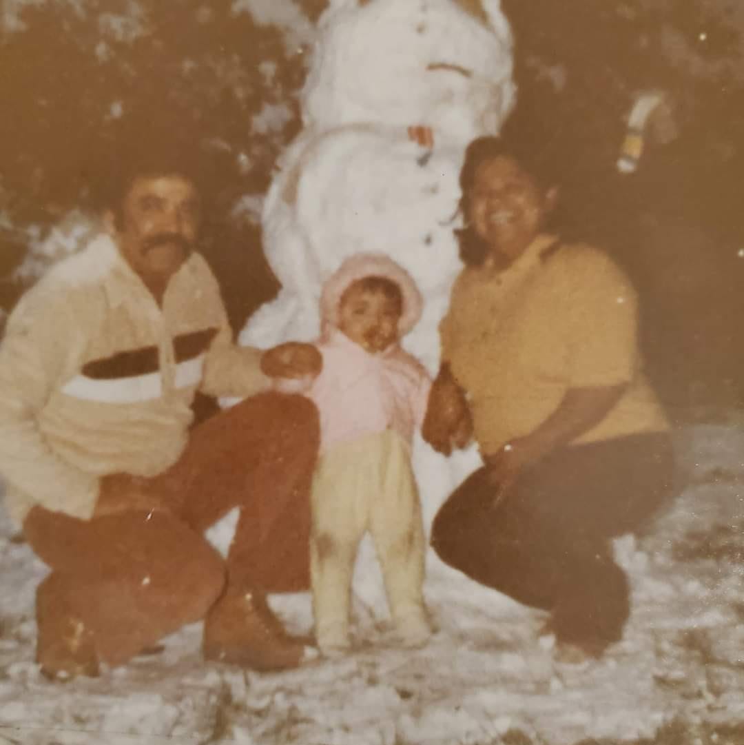 Jose Angel Rosas, one of the Seneca Foods migrant workers who died of COVID-19, started migrating north from Texas to work for the agricultural industry more than three decades ago. In this photo, taken about 37 years ago, he is with his daughter Sanjuanita Rosas, in North Dakota, where he worked in the fields during the season.