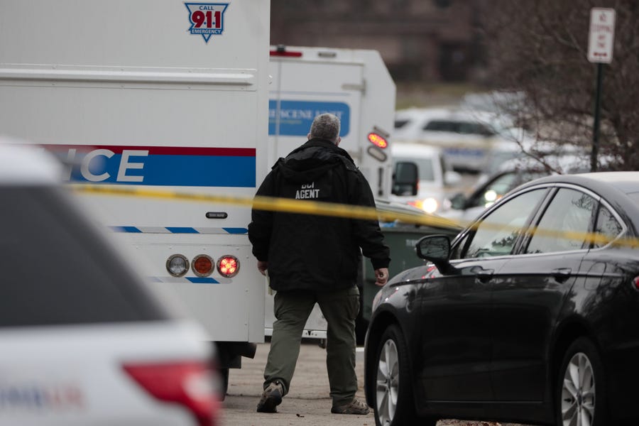 An Ohio Bureau of Criminal Investigation agent arrives at the scene of an officer-involved shooting on Tuesday, Dec. 22, 2020 in Columbus, Ohio.