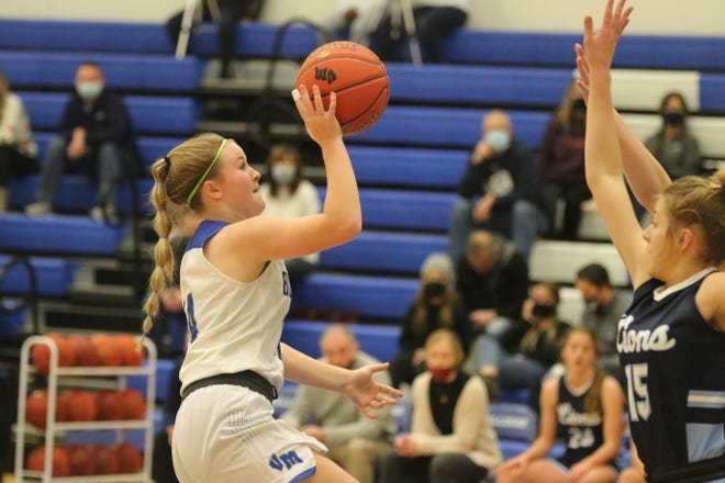 Van Meter's Maia Abrahamson with the shot attempt during a game last season against Des Moines Christian.