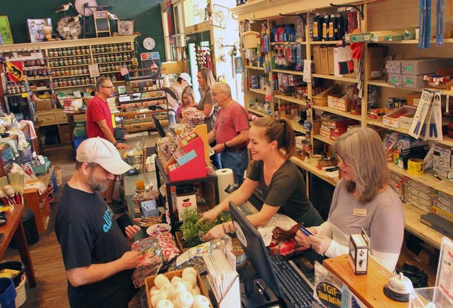 Mitchell Hardware at 215 Craven Street, helps customers with Spring season goods and gardening supplies in historic downtown New Bern, NC, March 19, 2020. Mitchell Hardware has been open in the New Bern area since 1898.