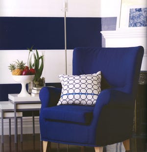 These bold stripes provide a youthful and adventurous background for an upbeat living space.