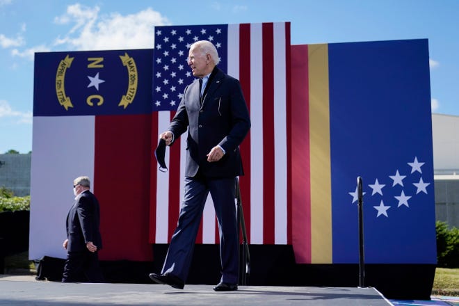 Democratic presidential candidate former Vice President Joe Biden arrives to speak during a campaign event at Riverside High School in Durham on Oct. 18.