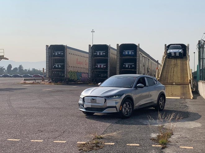 All-electric 2021 Ford Mustang Mach-E SUVs are being loaded onto rail cars on December 19, 2020 after being assembled at the Ford plant in Cuautitlán, Izcalli, Mexico. Vehicles are scheduled for delivery to customers in the U.S. this month.