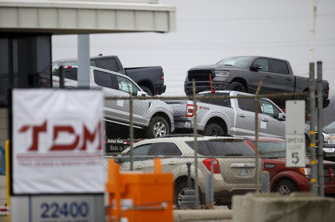 Ford F-150s are parked at TDM, Troy Design and Manufacturing Co. on Monday, Dec. 21, 2020, across from the Flat Rock Assembly Plant.