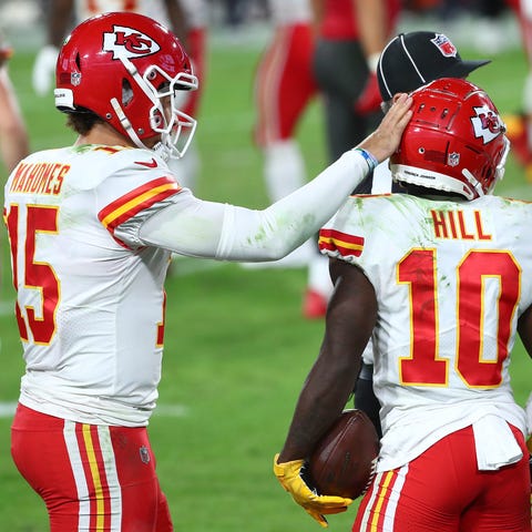 The Chiefs' Patrick Mahomes, Tyreek Hill and Travi