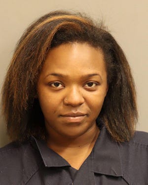Selena Nicole May was charged with first-degree domestic violence and shooting into an occupied vehicle.