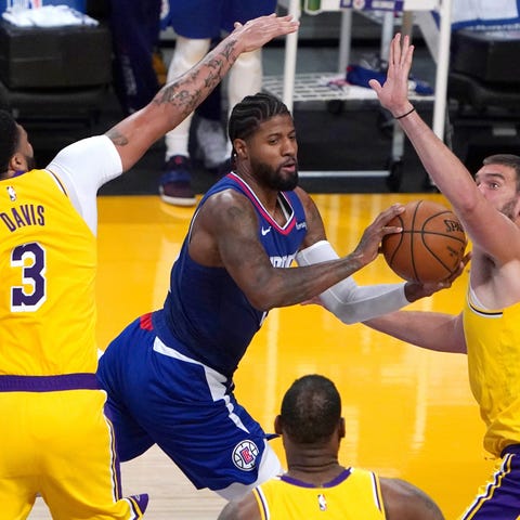 Paul George drives to the hoop against the Lakers.