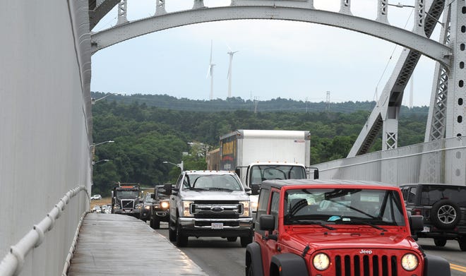 Automatic license plate readers that take photos of license plates and record date and time data of vehicles crossing the Sagamore and Bourne bridges - and other sites across the state - will not be used for the time being because of a data recording glitch.