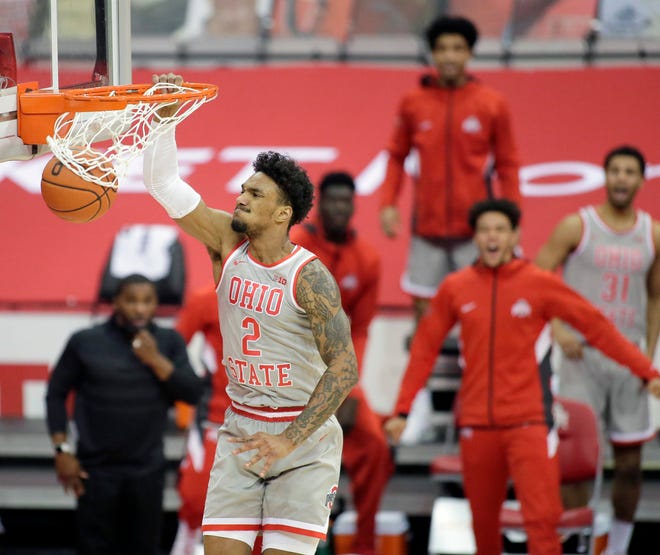 Ohio State Buckeyes guard Musa Jallow (2) flies to the hoop for a dunk during the second half of Wednesday's NCAA Division I basketball game against the Rutgers Scarlet Knights at Value City Arena in Columbus, Oh. on December 23, 2020. Ohio State won the game 80-68.