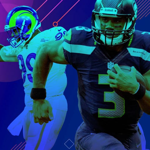 Aaron Donald (99) and Russell Wilson