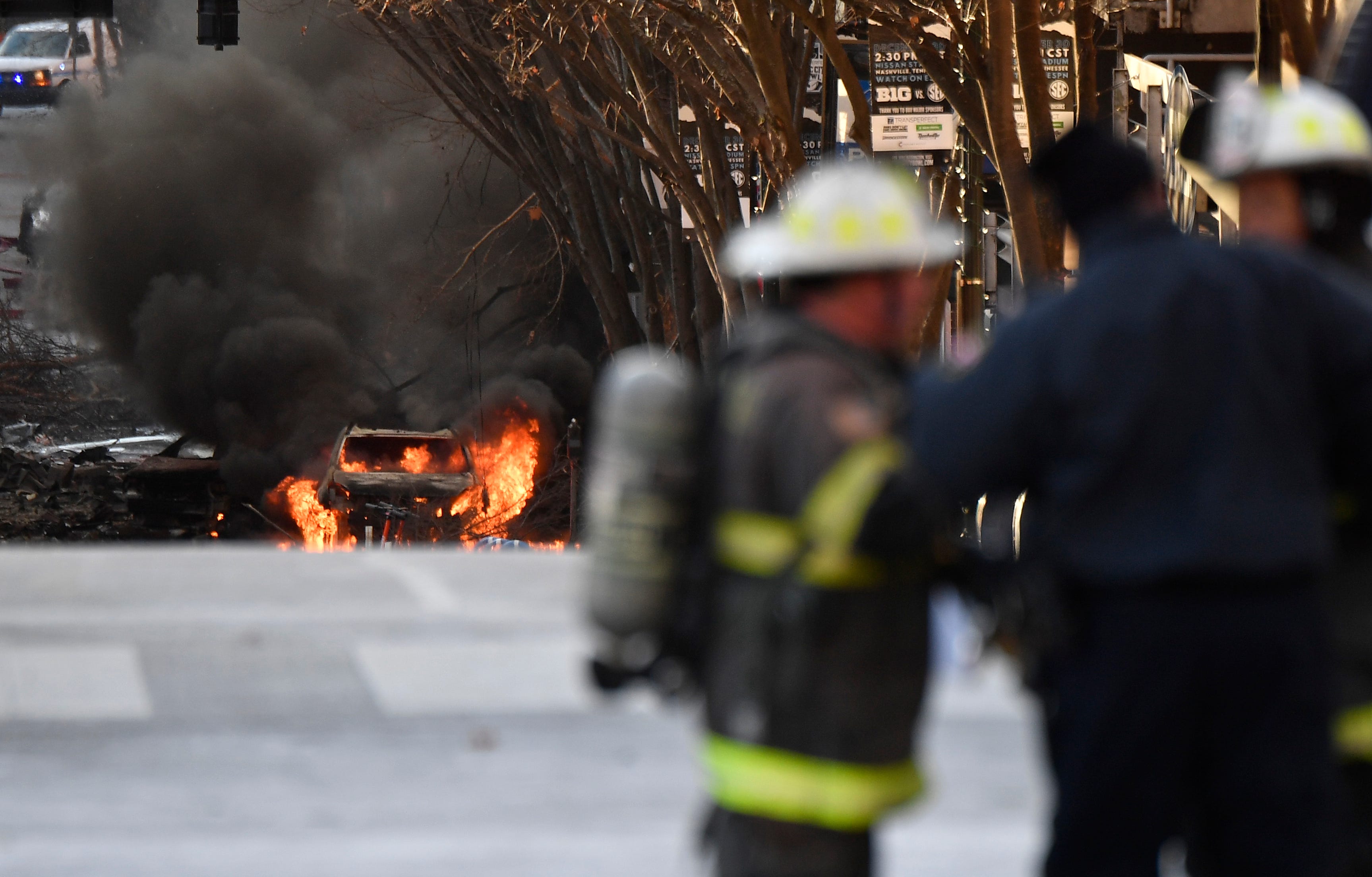 A vehicle is on fire after an explosion in the area of Second and Commerce Friday, Dec. 25, 2020 in Nashville, Tenn. 