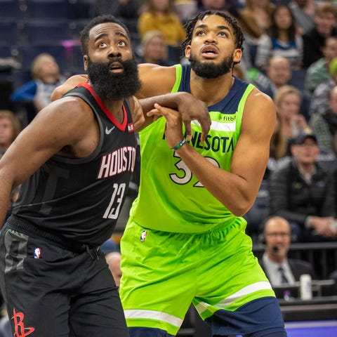 Houston Rockets guard James Harden and Minnesota T