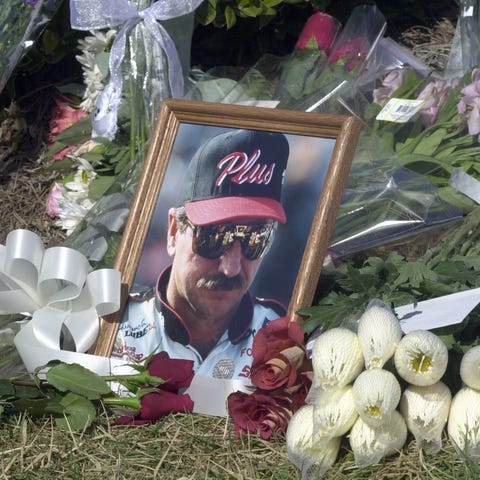 A portrait of Dale Earnhardt sits in a memorial at