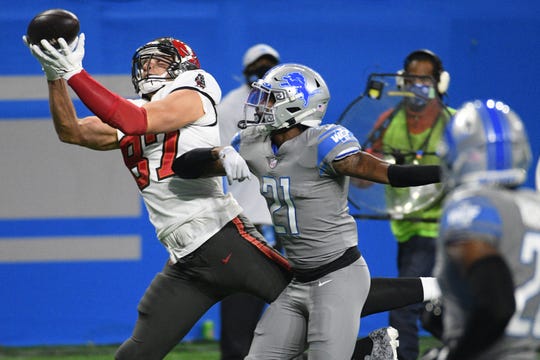 Former UL safety Tracy Walker (21) of the Lions tries to break up a catch by Tampa Bay Buccaneers tight end Rob Gronkowski last season in Detroit.