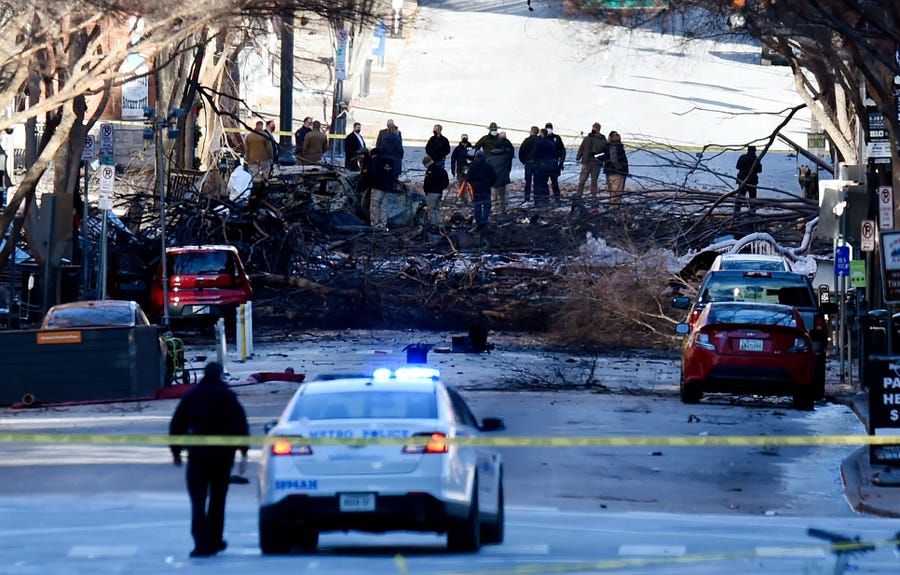 Authorities investigate on Dec. 26 in Nashville, Tenn., the day after an RV exploded. Several blocks downtown are sealed off as the FBI and other agencies investigate.