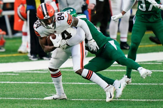 Former UL receiver Ja'Marcus Bradley of the Cleveland Browns is hauled down during a Dec. 27, 2020, game against the New York Jets in East Rutherford, N.J.