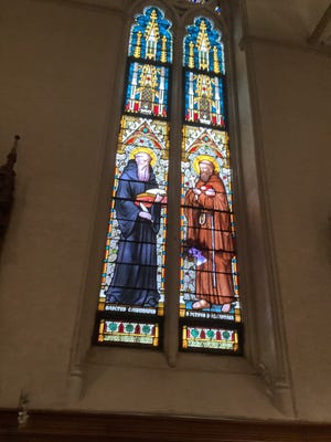 Damage to one of the oldest stained-glass windows is visible from the interior of the Cathedral of Saint Mary of Assumption after weekend vandalism. A man was arrested in October for a similar act.