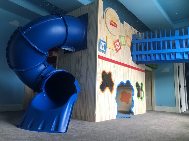 Many homes at Reunion Resort have over-the-top indoor entertainment, like this Toy Story-themed playroom.