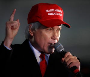 Attorney Lin Wood, member of President Donald Trump's legal team, gestures while speaking during a rally on Wednesday, Dec. 2, 2020, in Alpharetta, Ga.