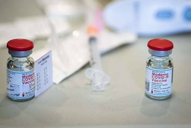 The Moderna COVID-19 vaccine sits ready to be administered by CVS on Dec. 28, 2020.