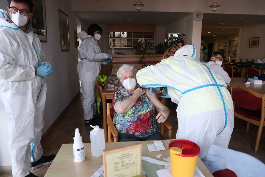 Karolina Ernst receives a Covid-19 vaccination on the first day of the nationwide launch of Covid-19 vaccinations during the second wave of the coronavirus pandemic on December 27, 2020 in Plattling, Germany.