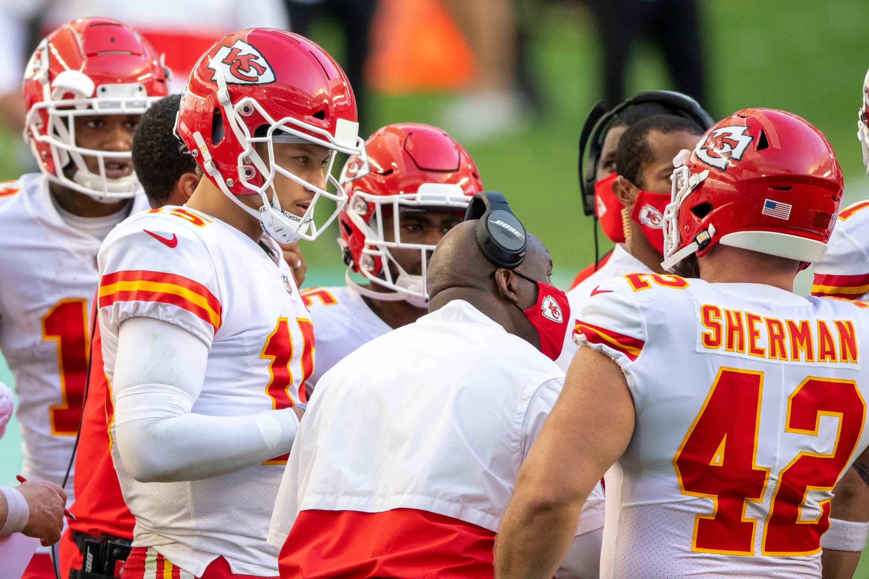 Patrick Mahomes, left, listens to Eric Bieniemy on the field and off it as the two have developed a close relationship