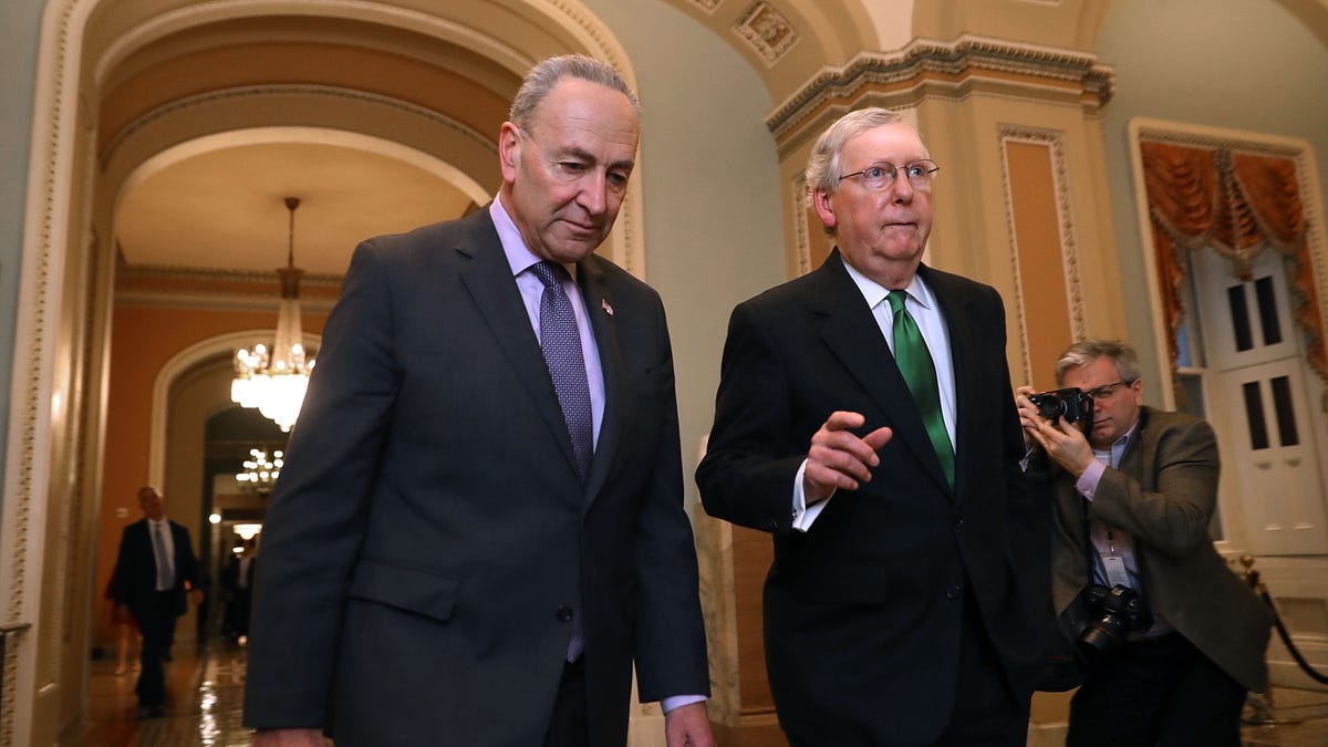 In this 2018 picture (from left) Senate Minority Leader Charles Schumer (D-NY) and Senate Majority Leader Mitch McConnell (R-KY) walk side-by-side to the Senate Chamber at the U.S. Capitol in Washington, DC.
