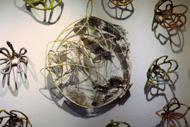 Larla Morales' art, displayed on the second floor of The Center for Contemporary Arts, includes basket-shaped pieces inspired by a year that turned many people in "basket cases," she said.
