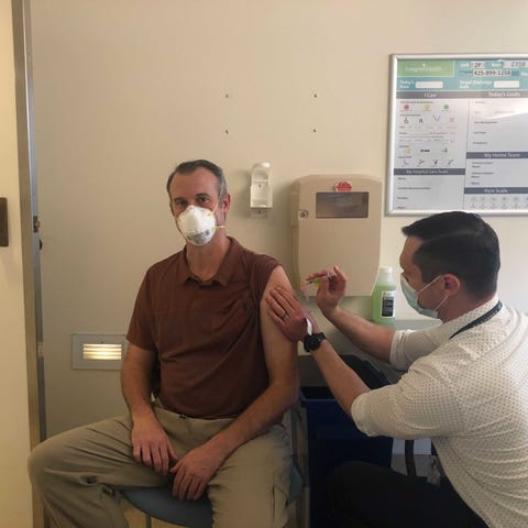 Brad Younggren receiving a COVID-19 vaccine at Eve