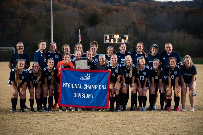 Johnson University’s women’s soccer team celebrates their Regional Champions Division II title on Nov. 7, 2020. Todd Halliburton is at far left.
