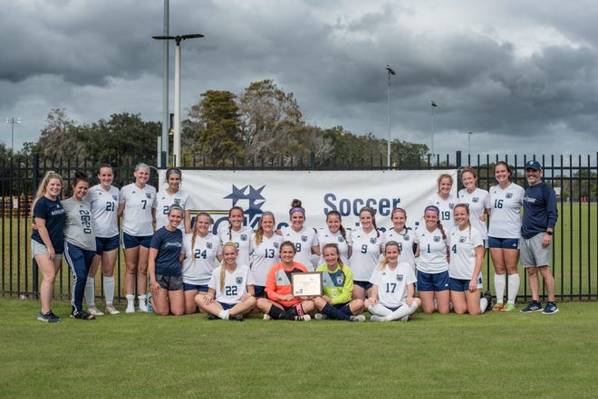 Johnson University’s women’s soccer team celebrates third place at the Division II Women’s Soccer Championship in Kissimmee, Florida, on Nov. 19, 2020. “Overall we try to have fun,” said head coach Todd Halliburton. “The reality is that a small percentage will go on to achieve a professional level of athletics. We want to compete and be as good as we can be, but four years of soccer should complement, not be the sum of your four years at college.”