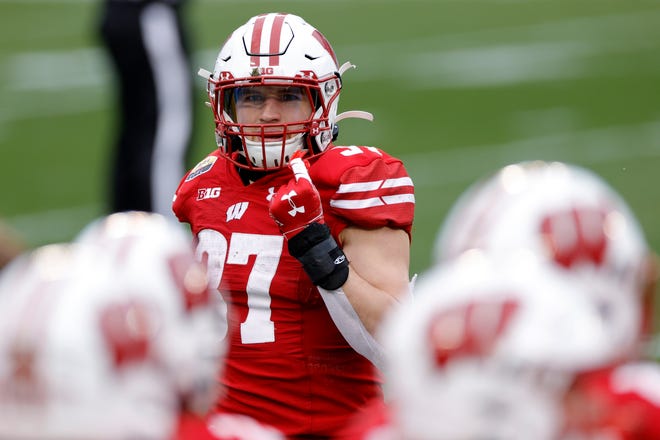 Former Wisconsin running back Garrett Groshek was brought in as a temporary hire to fill in for Gary Brown.