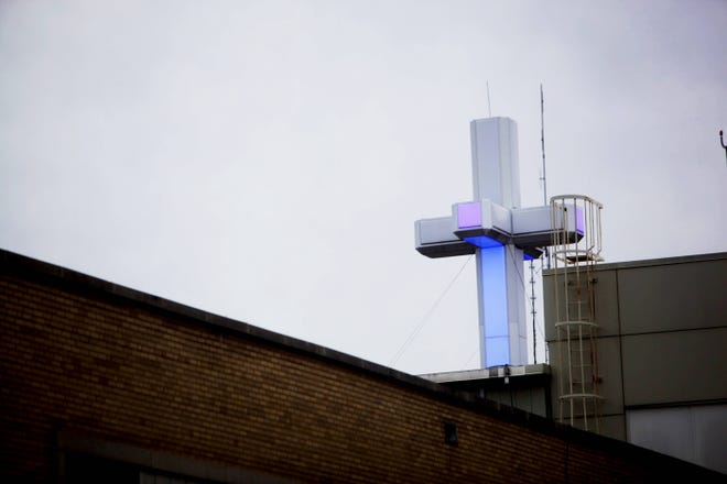 The cross on top of Mercy Hospital Springfield was installed just before Christmas 1980.  The hospital spokesman at the time had to make it clear it would be on display for years to come, long after that particular holiday season.