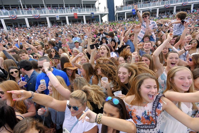 Players Championship fans rock to the Chainsmokers in 2020 at the 17th hole of the Players Stadium Course at TPC Sawgrass. Military Appreciation Day and a Kelseas Ballerini concert will return to the 2022 Players.