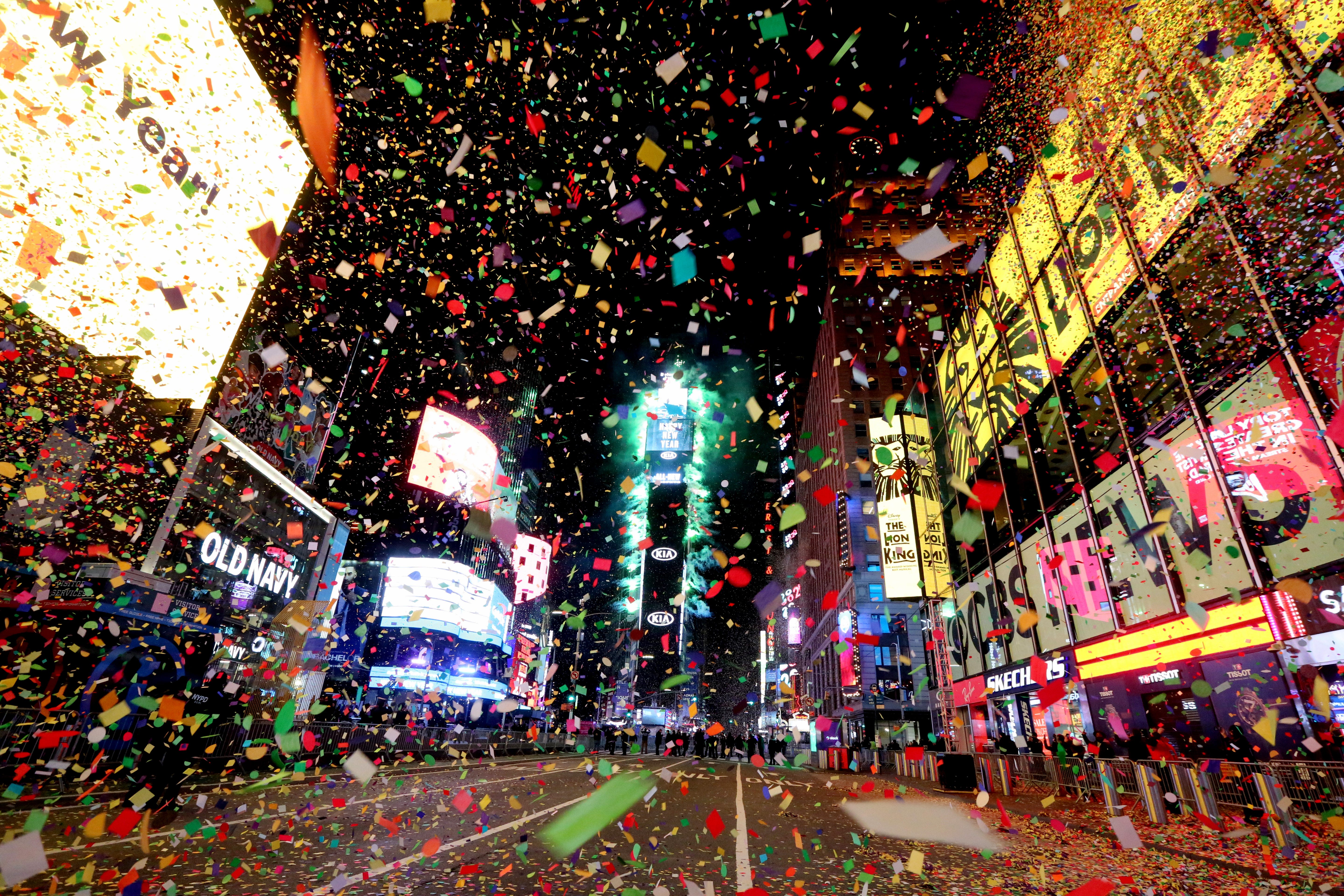 Times Square, usually packed with thousands for New Year's celebrations, was closed to all but a select few in 2020 due to COVID-19 restrictions. Here confetti rains down on the empty streets after the ball drop, marking the start of 2021.