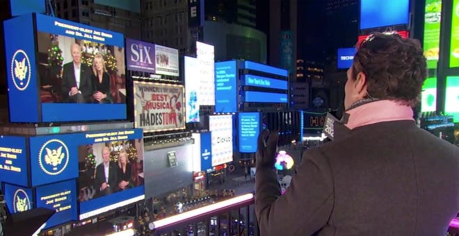 Ryan Seacrest interviews Joe and Jill Biden from across Times Square.