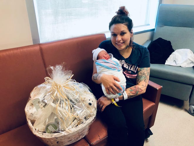 Kristy Faciane holds her baby Aubrella Rosales Faciane, whose birth Saturday morning made her Terrebonne's first baby of 2021.