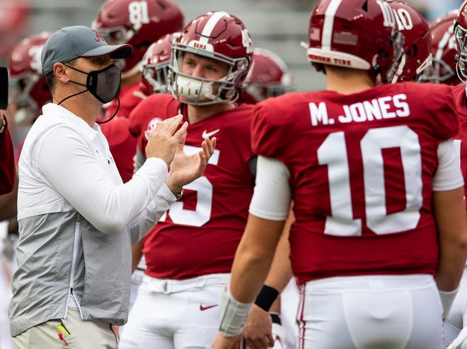 Alabama offensive coordinator Steve Sarkisian takes the field for team warmups before the Nov. 28 win over Auburn; Crimson Tide head coach Nick Saban missed the game because of COVID-19 quarantine, and Sarkisian acted as head coach.