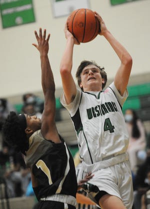 West Branch's Jason Hendershott drives to the basket against St. Thomas Aquinas during a game last season.