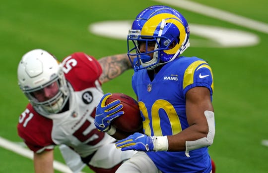 Former UL running back Raymond Calais Jr. (30), a Cecelia High product, returns a kickoff for the Los Angeles Rams against Arizona during Jan. 3 game in Inglewood, California.