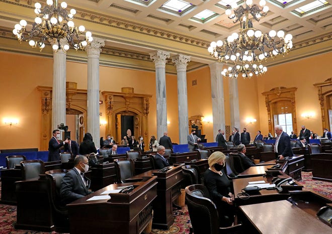 Members the of Ohio Senate take their seats as a new General Assembly begins on Jan. 4 at the Ohio Statehouse.