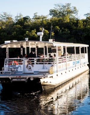 A Banana Bay Tour heads out for a sunset tour from behind Rumrunners at Cape Harbour. The tour company also does eco dolphin tours on Wednesday and Saturday, departing at 11 a.m.